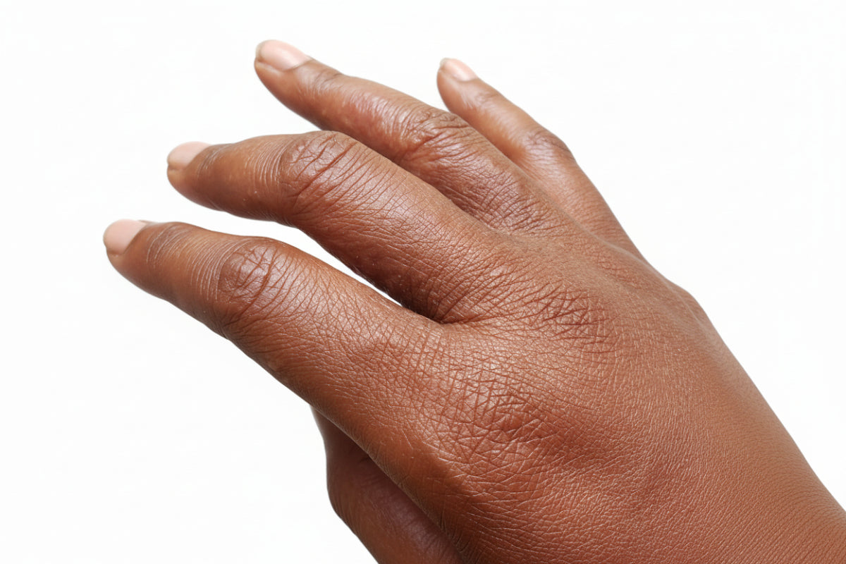 Close-up of a person's hand with a blurred background