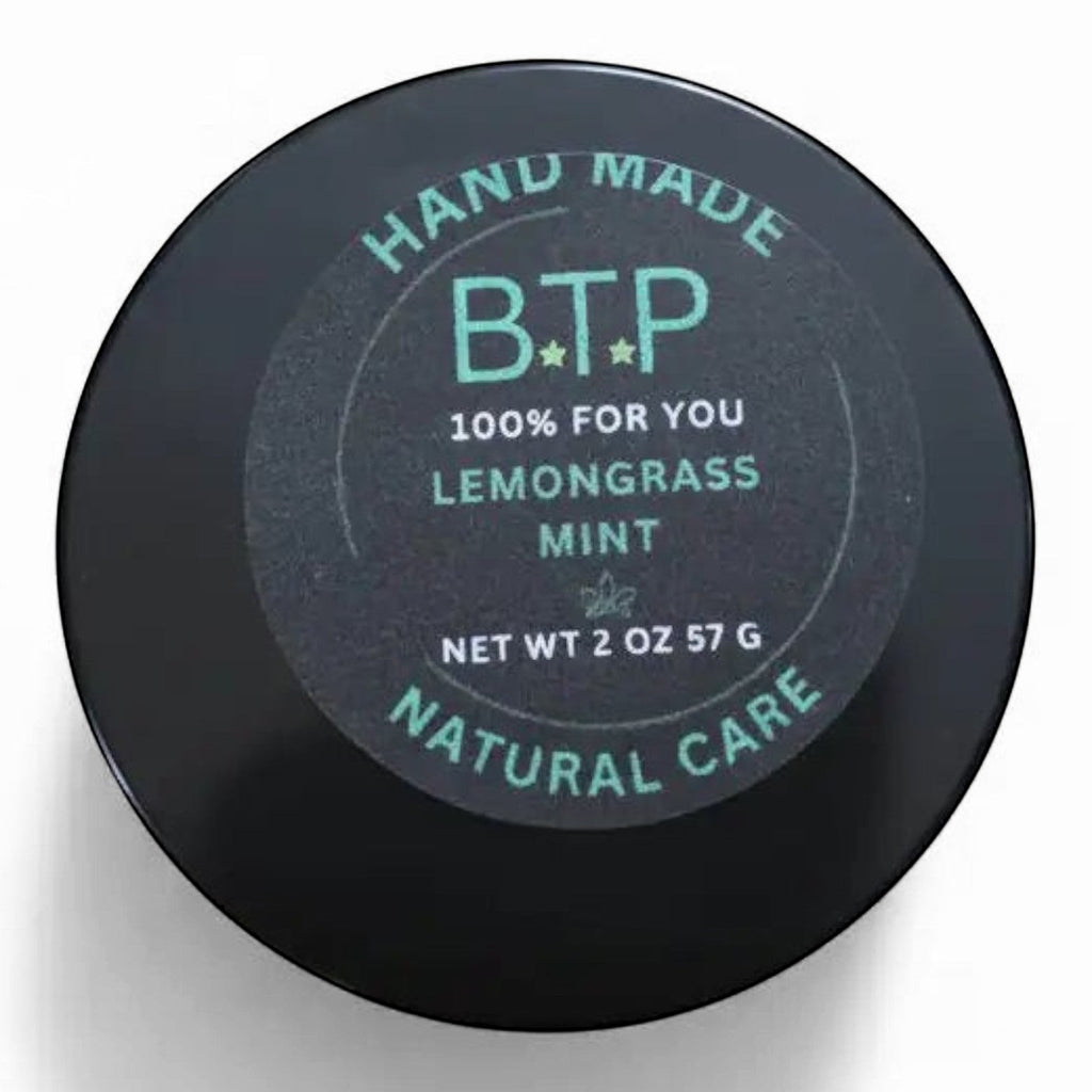 Infinite Storefront B.T.P handmade lemongrass and mint moisturizing body balm in a 2 oz black jar, top view.